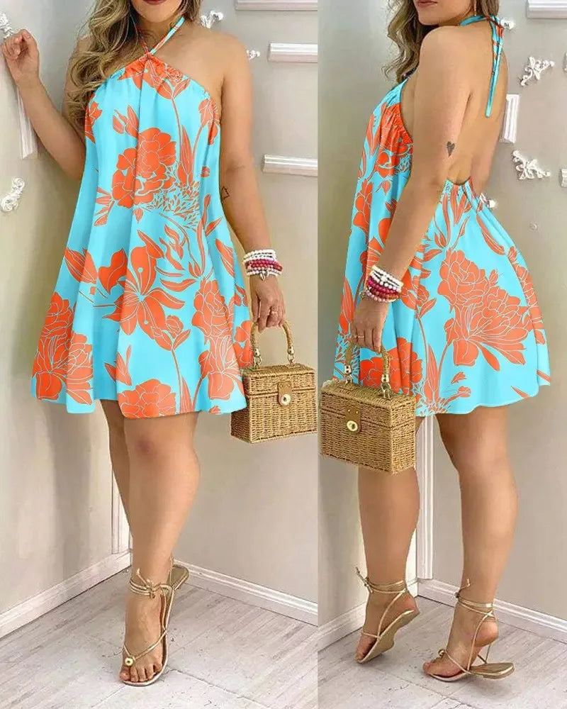 Vestido com decote halter estampado tropical