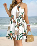 Vestido com decote halter estampado tropical